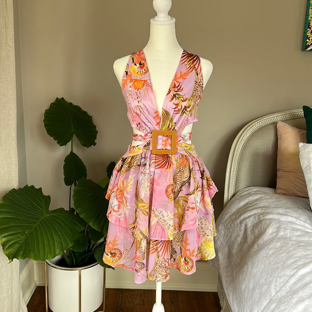 Tropical Vacay ready! Sexy designer inspired dress with a plunging neckline.